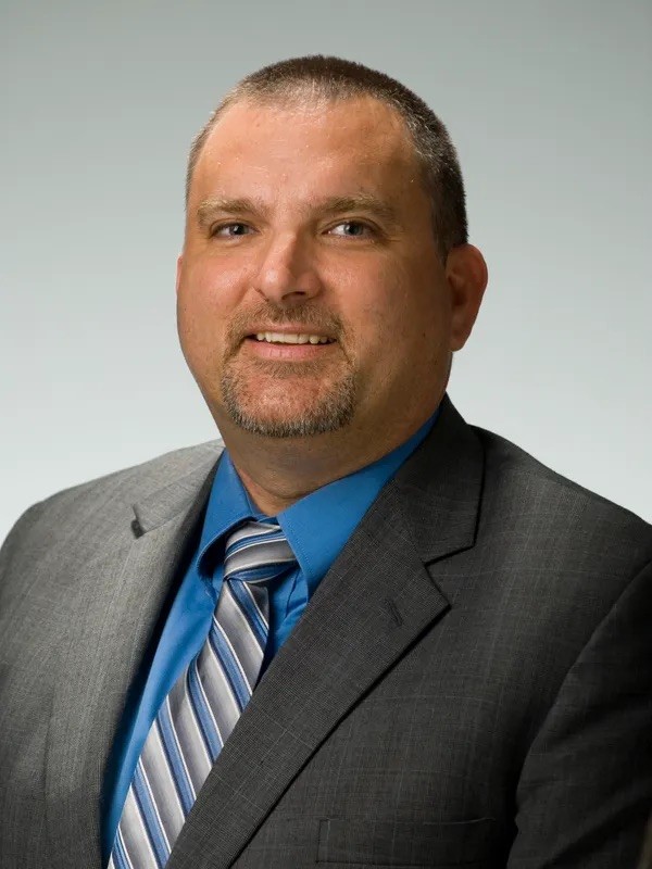 Headshot of commissioner Dwayne Rogers