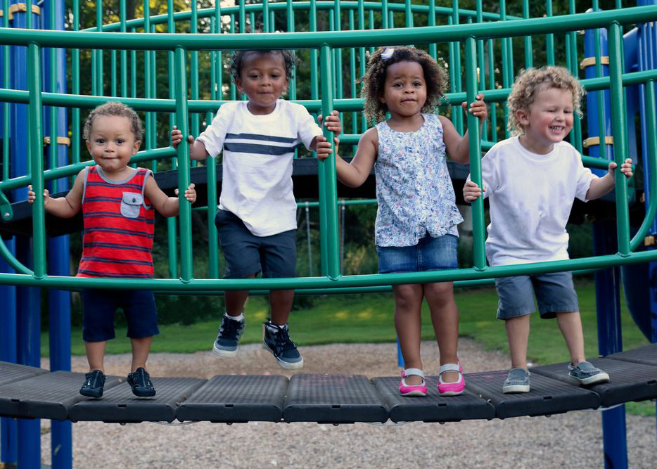 Children standing on elevated bridge